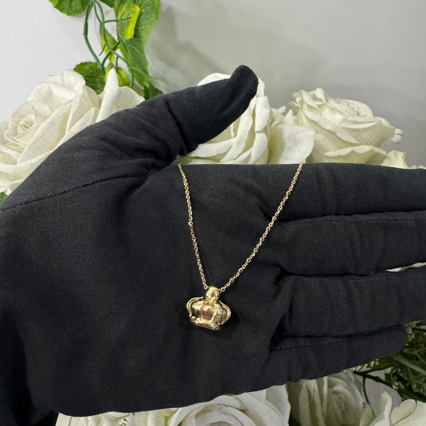 Collana rolò con corona bombè oro