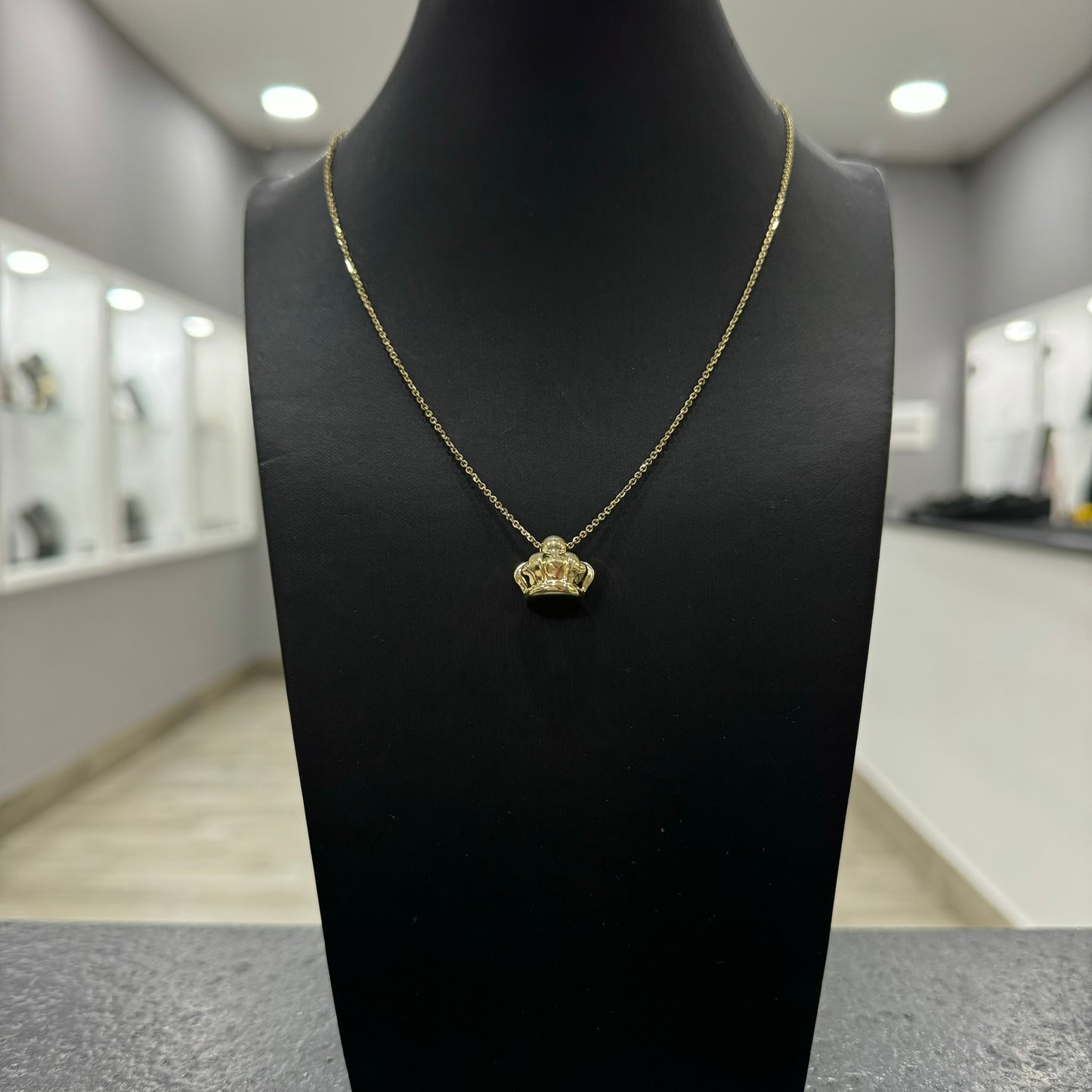 Collana rolò con corona bombè oro