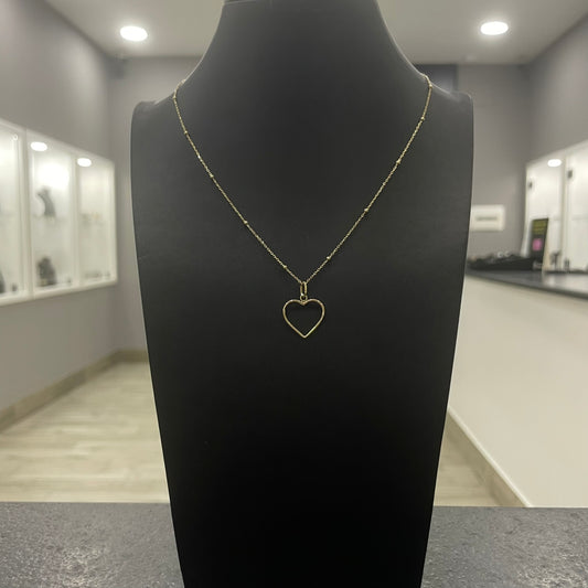 Collana rollò e sfere con cuore forato oro