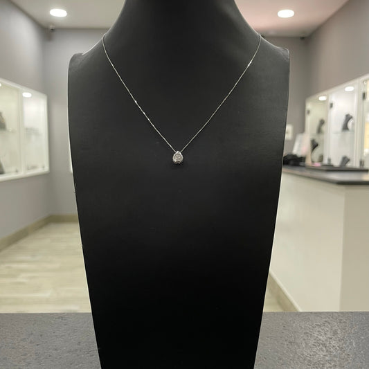 Collana con goccia punto luce oro e diamanti